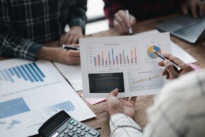 Company meeting room has businessmen and finance managers meeting together on finance topics, they a