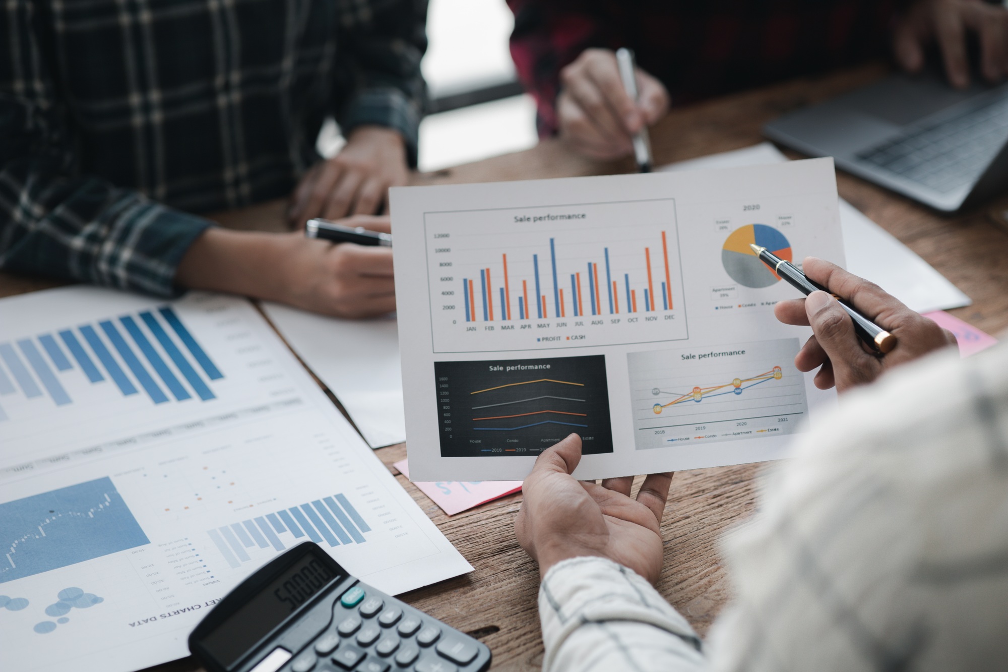 Company meeting room has businessmen and finance managers meeting together on finance topics, they a